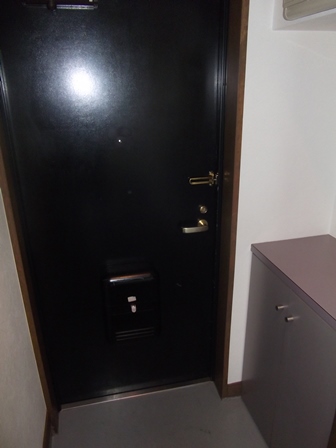 Entrance. With shoe box